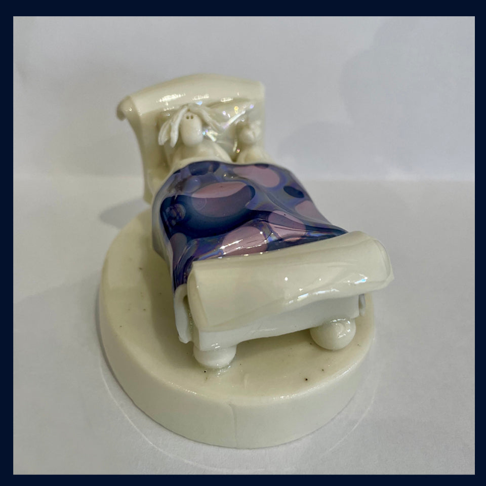 Ceramic Miniaturist Andrew Bull - lady in bed with cat