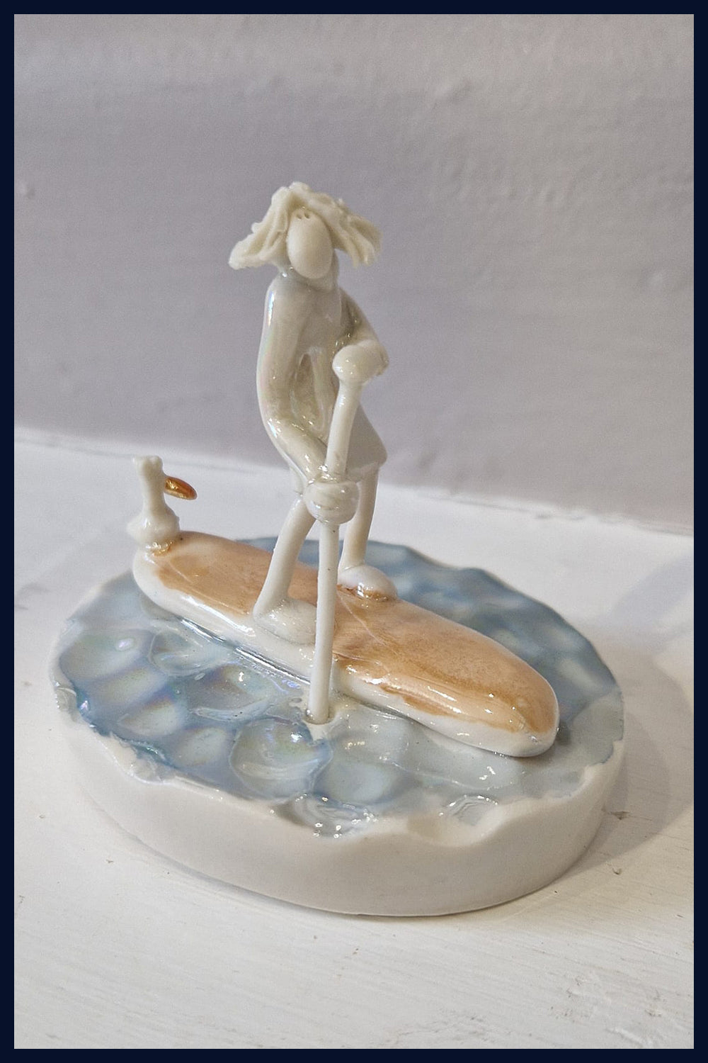 Ceramic Miniaturist Andrew Bull - paddle boarder
