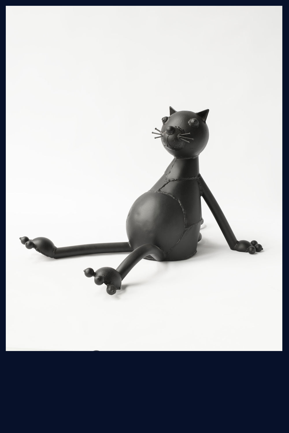 Slouching Cat Sculpture by Mick Kirkby-Geddes
