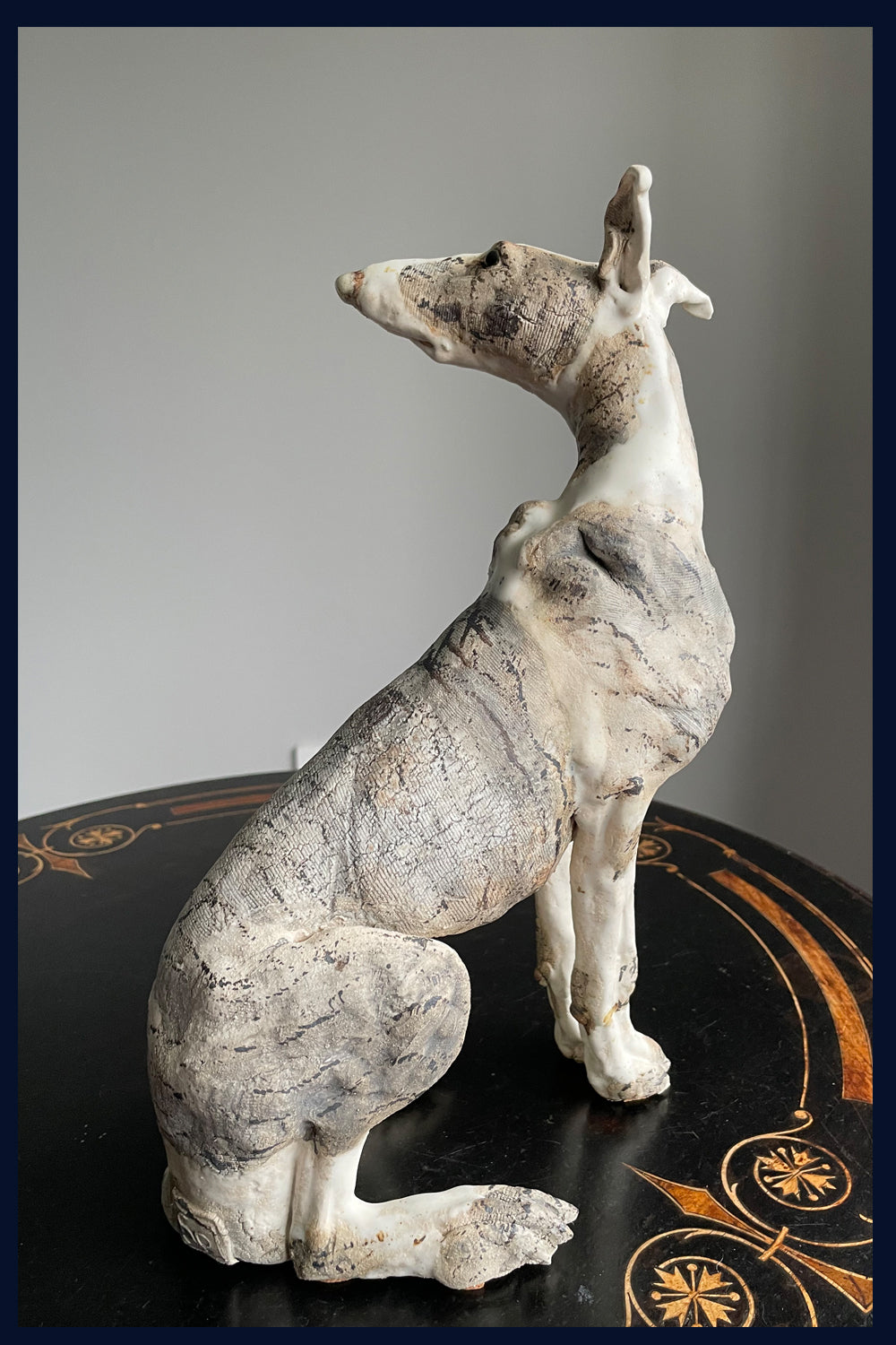 Sitting Lurcher: Stoneware Sculpture by Elaine Peto