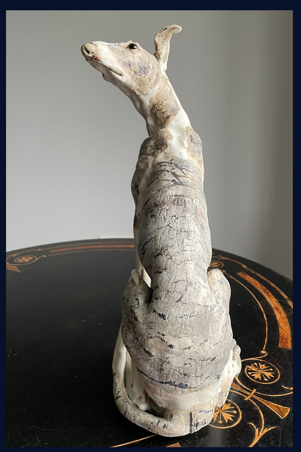 Sitting Lurcher: Stoneware Sculpture by Elaine Peto