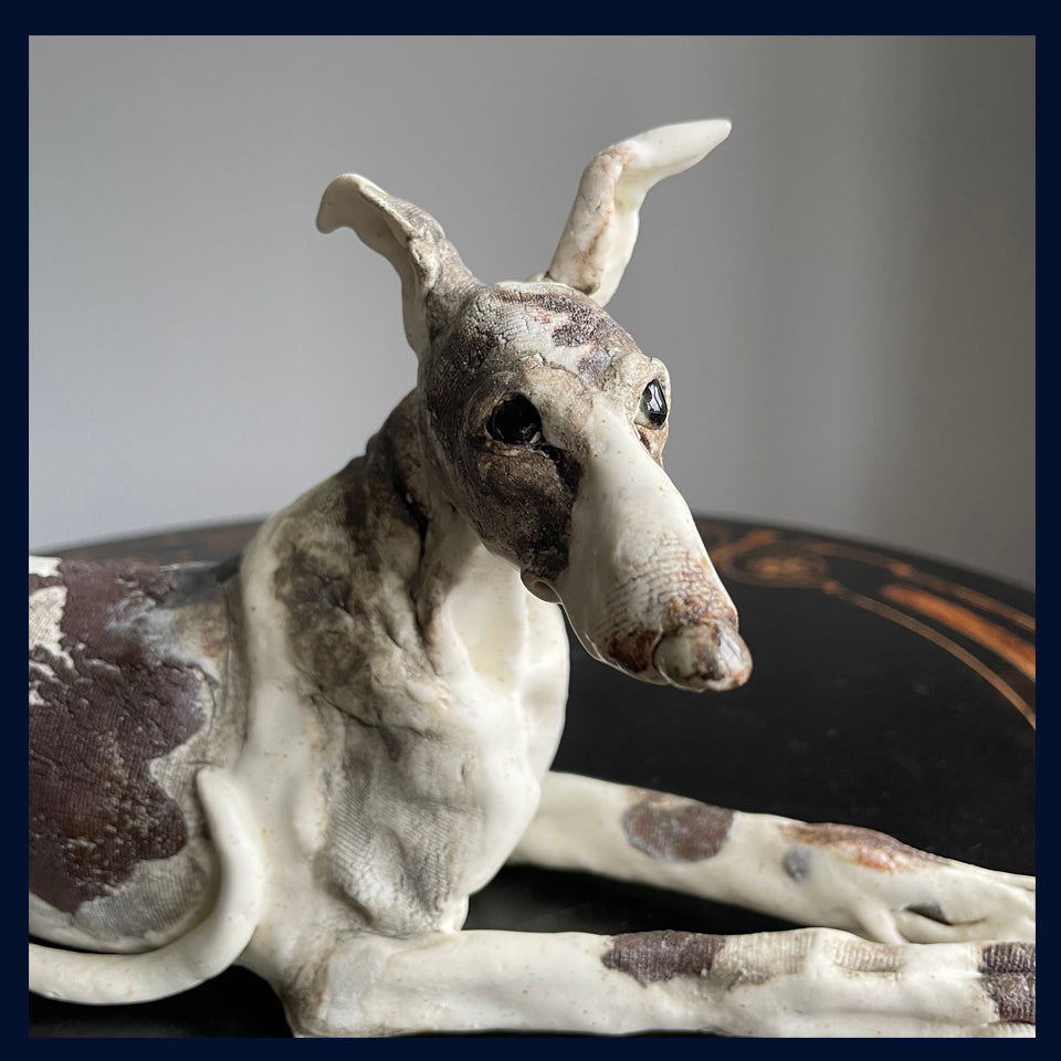 Lying Down Lurcher: Stoneware Sculpture by Elaine Peto