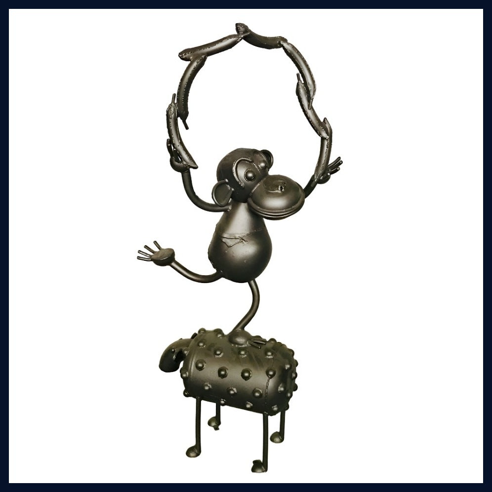Juggling Monkey Sculpture by Mick Kirkby-Geddes