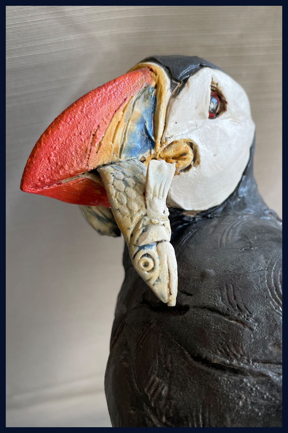 Puffin with Fish: Ceramic Sculpture by David Cooke