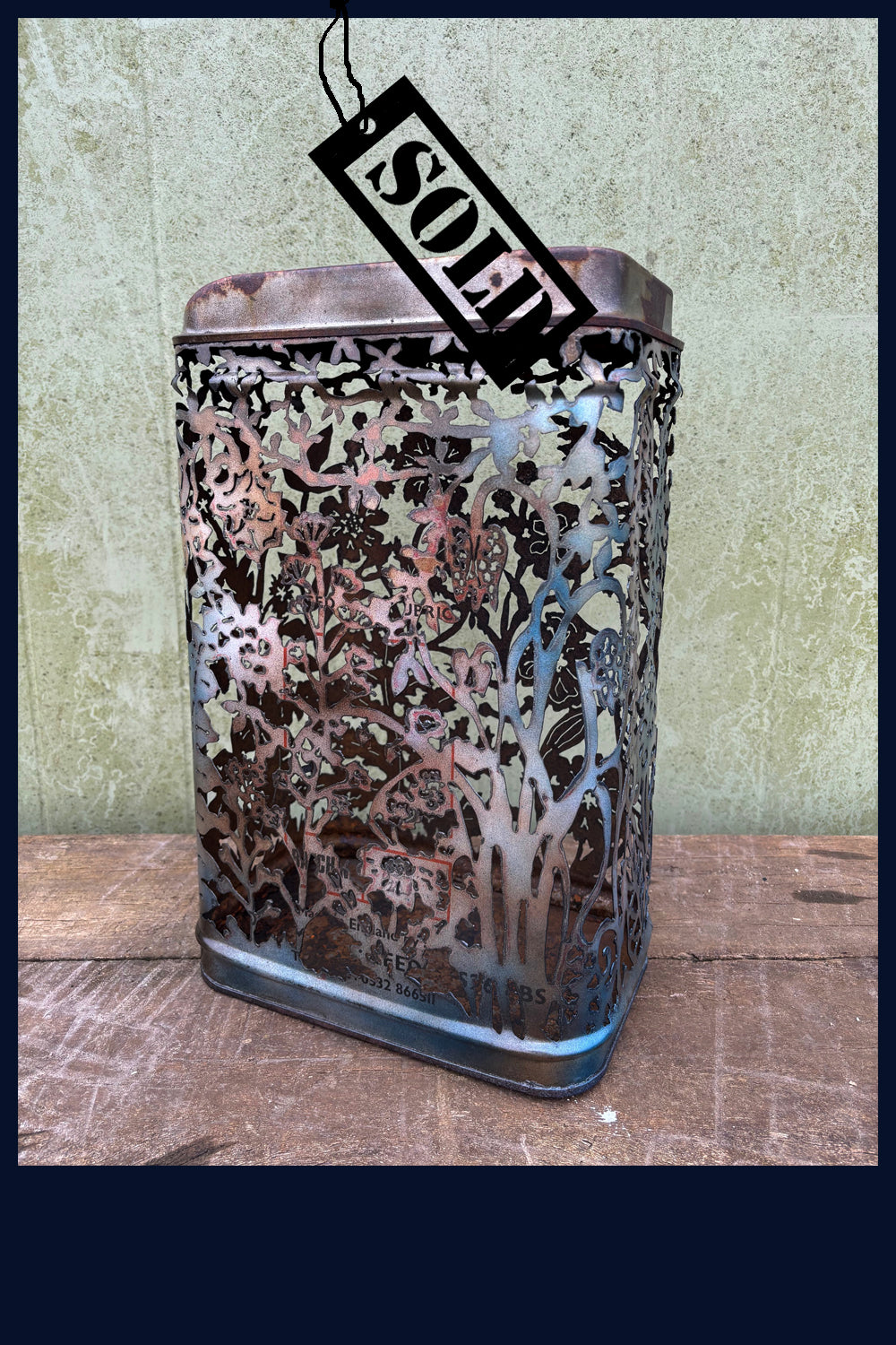 SOLD Nature's Metal Sculpture - reclaimed oil can