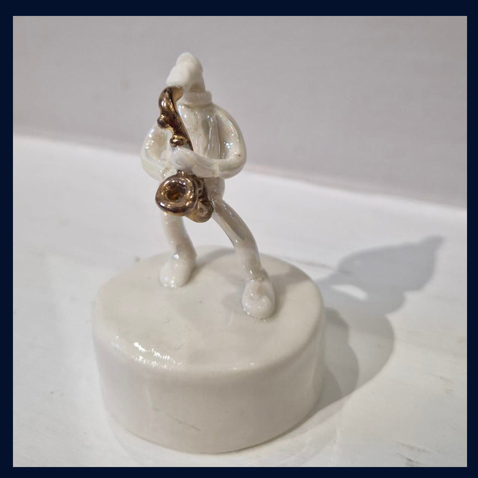 Ceramic Miniaturist Andrew Bull - man playing saxophone