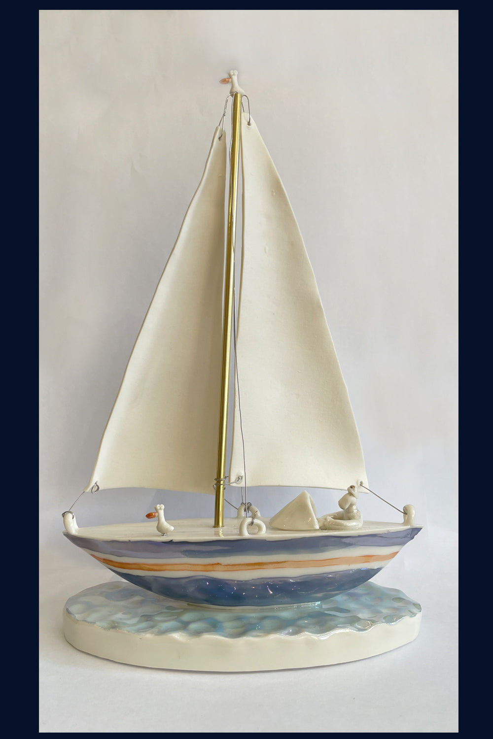 Ceramic Miniaturist Andrew Bull - sailing the yacht