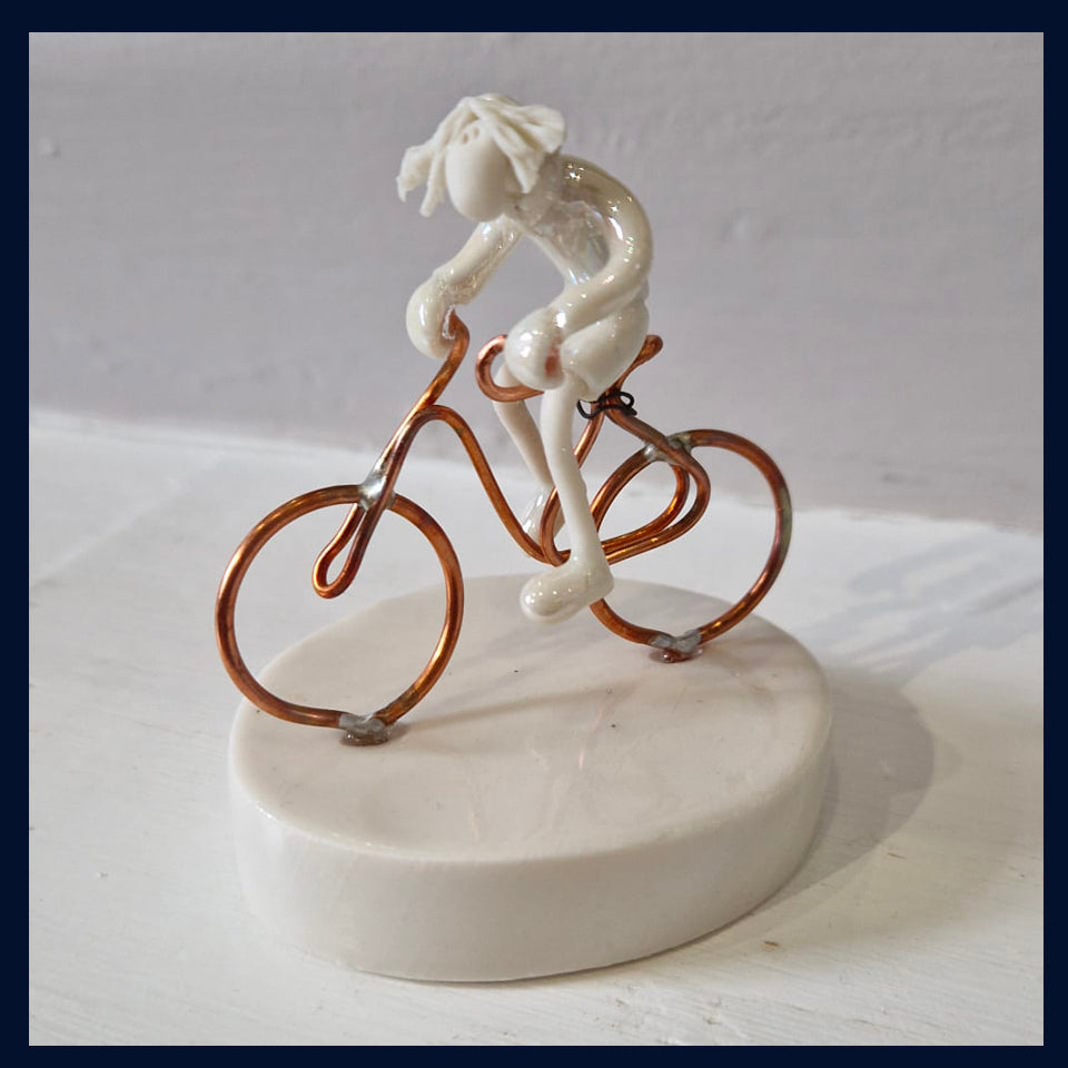 Ceramic Miniaturist Andrew Bull - female cyclist