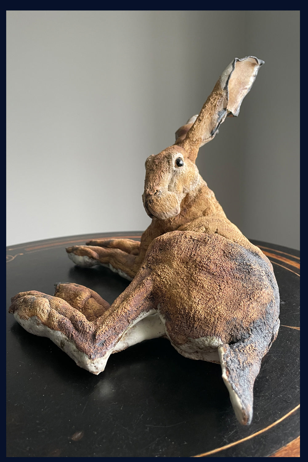 Lying Down Hare (medium): Ceramic Stoneware Sculpture by Elaine Peto