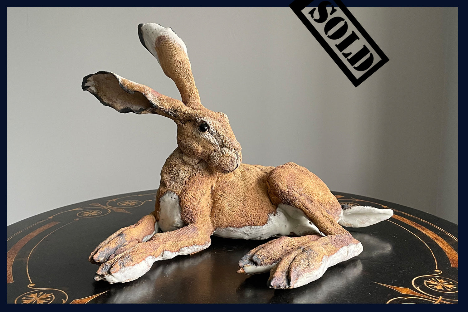SOLD Reclining Hare (medium): Ceramic Stoneware Sculpture by Elaine Peto