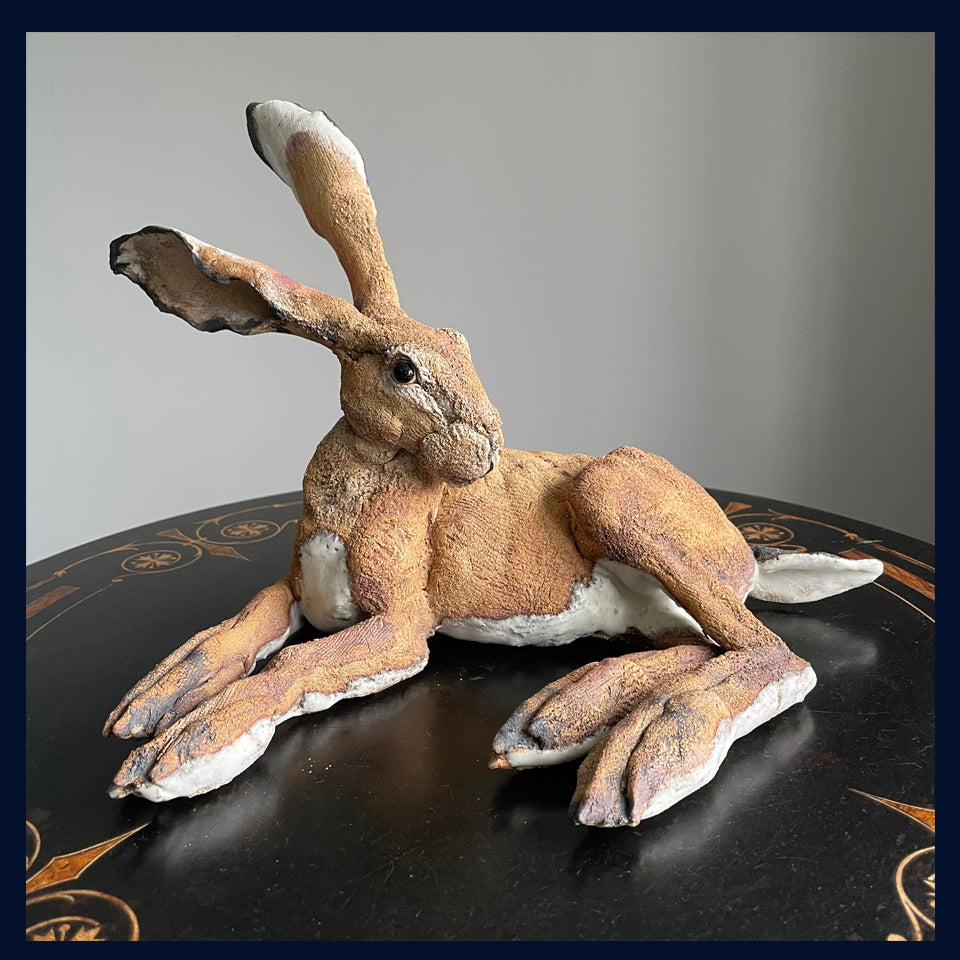Reclining Hare (medium): Ceramic Stoneware Sculpture by Elaine Peto