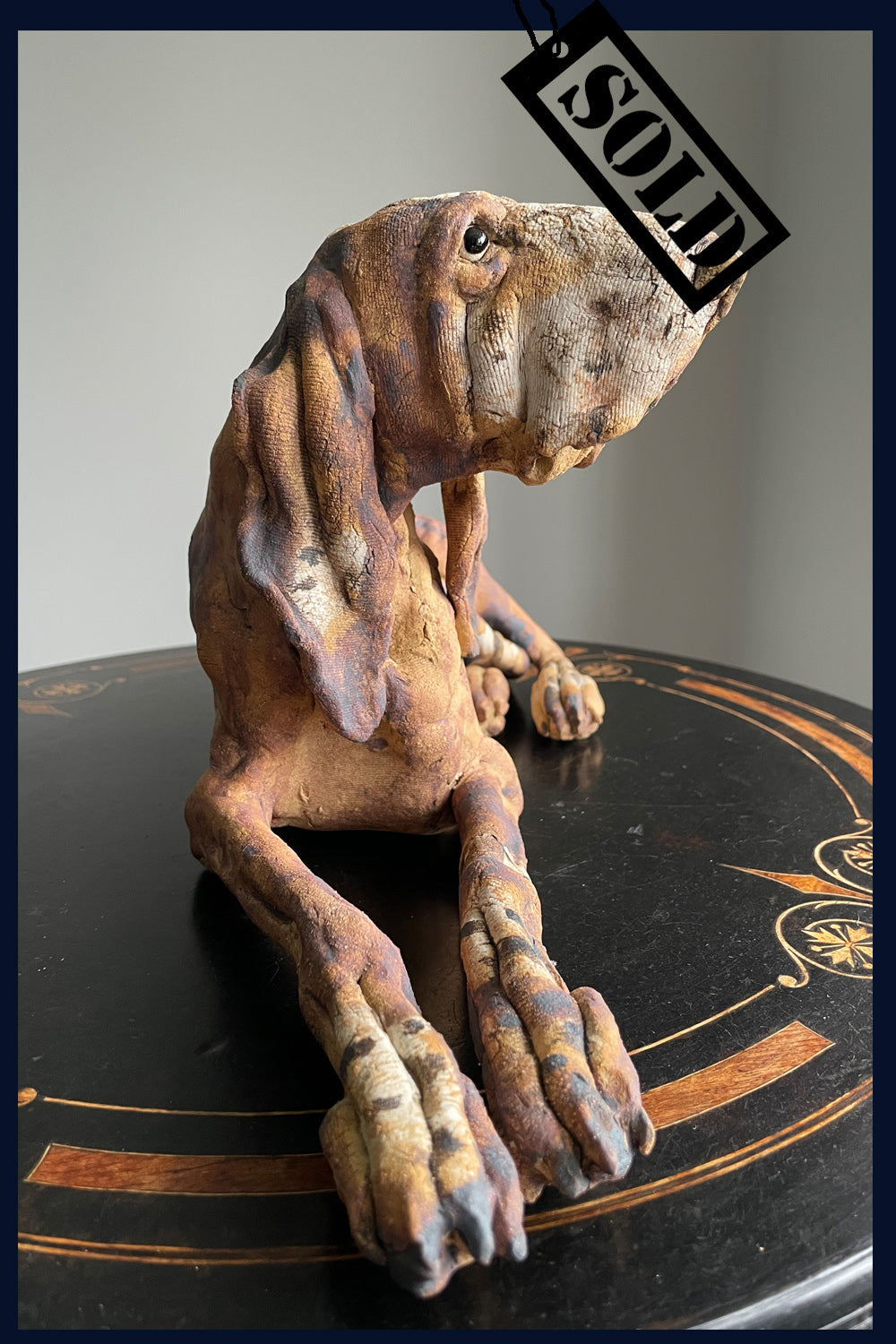 SOLD Reclining Hound Dog: Stoneware Sculpture by Elaine Peto