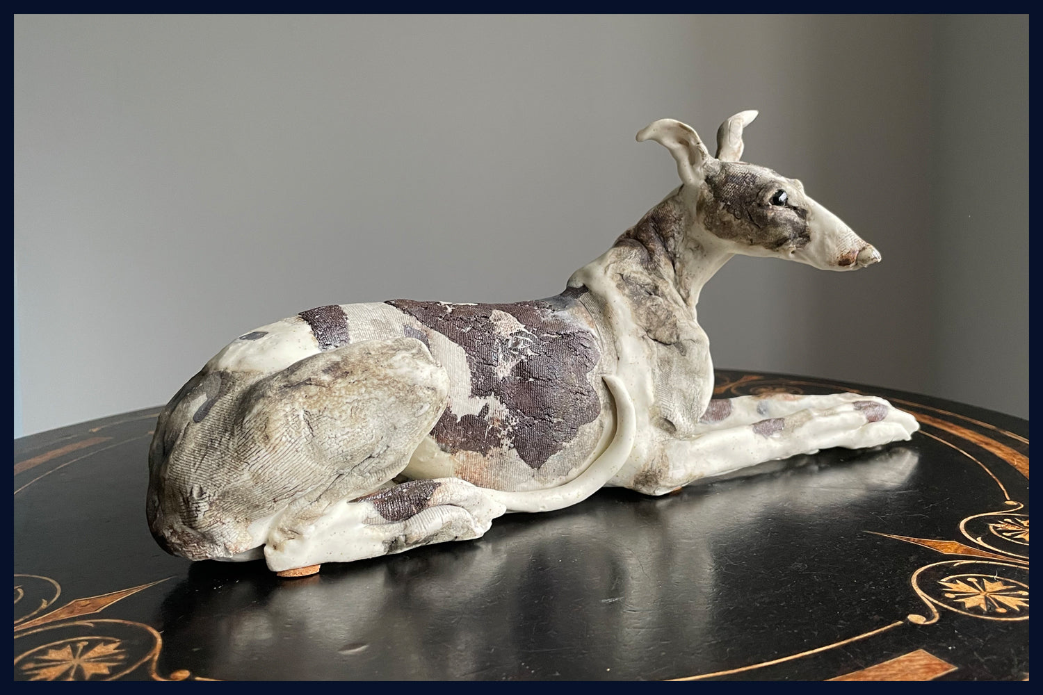 Lying Down Lurcher: Stoneware Sculpture by Elaine Peto
