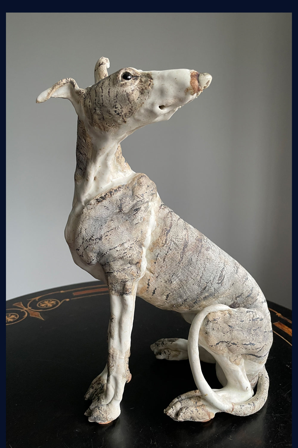 Sitting Lurcher: Stoneware Sculpture by Elaine Peto