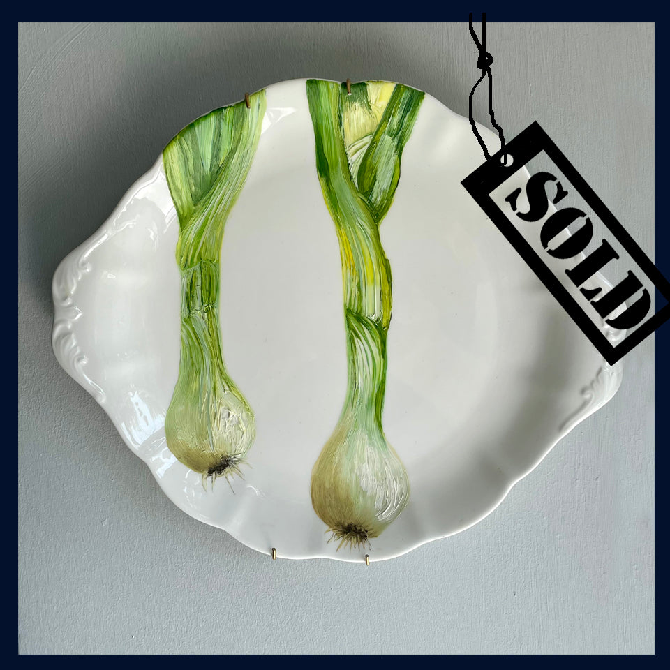 SOLD Plated: original fine art oil painting on a vintage cake plate - 2 large spring onions